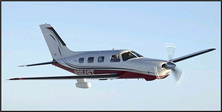 The Piper PA46 Mirage is shown here in signature red and white against the light blue evening sky